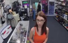 Sexy redhead gets fucked in the store